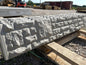 Patterned concrete gravel boards for use in outdoor fencing projects.
